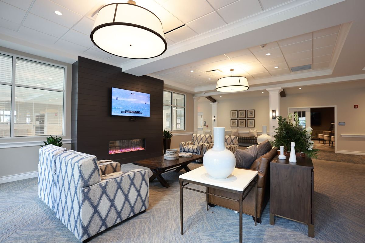 A modern living room with stylish furniture and contemporary lighting.