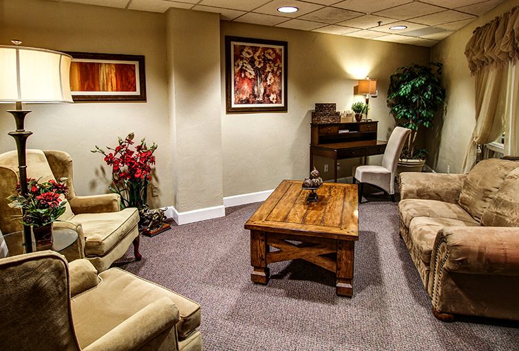 A cozy living room with comfortable seating and stylish decor.