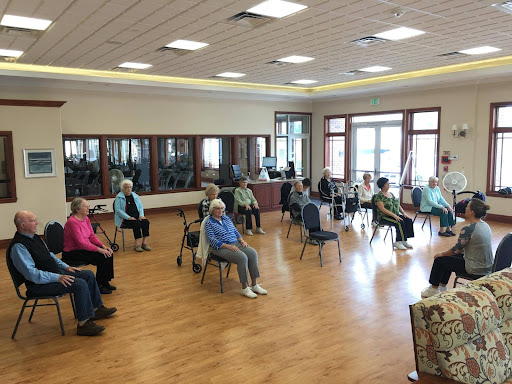 Seniors participating in a group activity at a community center.