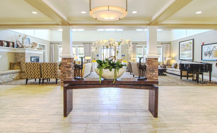 A modern and elegant lobby featuring stylish furniture and decor.