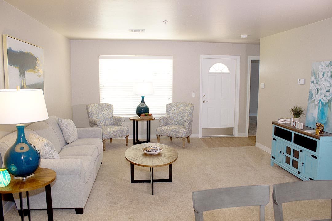 A cozy living room with comfortable seating and modern decor.