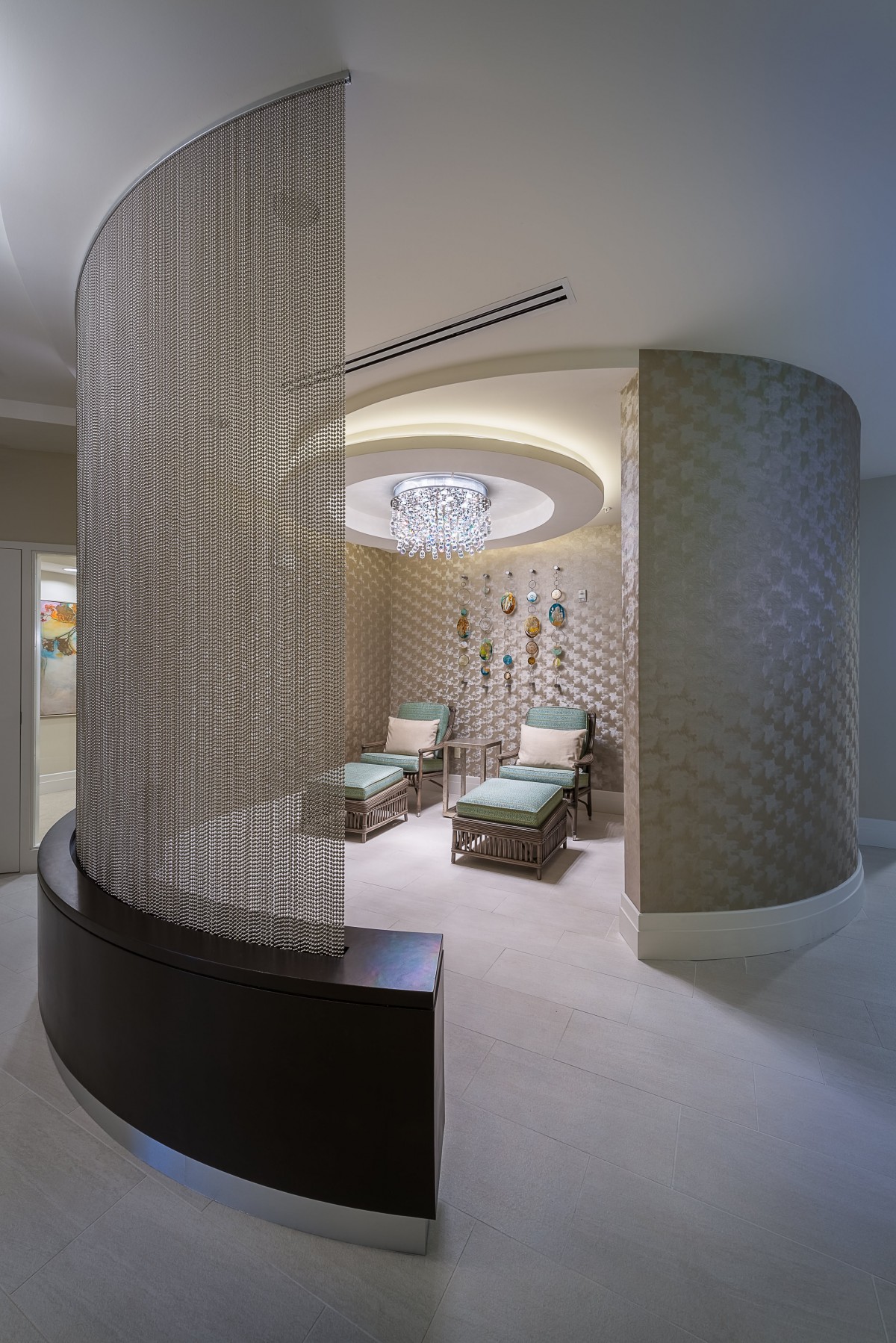 A luxurious spa relaxation area with comfortable lounge chairs and modern decor.