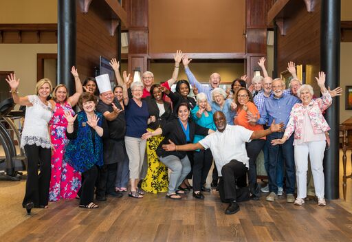 A joyful gathering of friends and family, celebrating together.