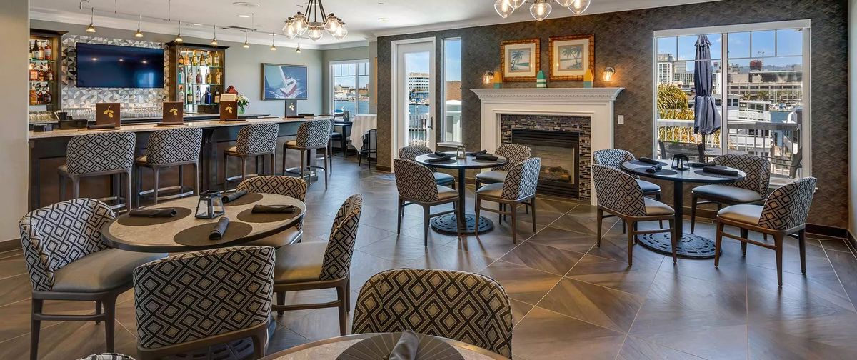 Modern restaurant interior with stylish decor and cozy seating.