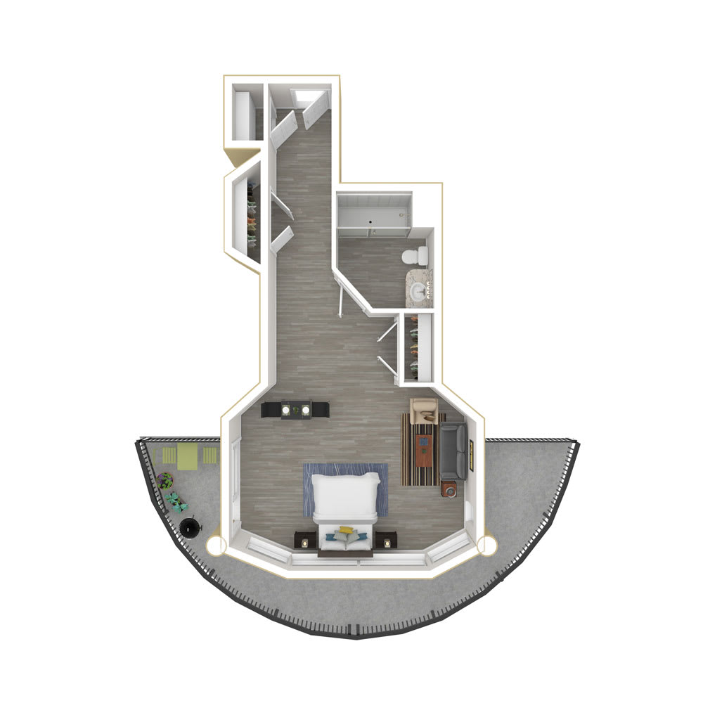 An overhead view of a studio apartment floor plan featuring a curved balcony.