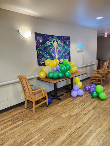 A festive setup with colorful balloons ready for a celebration.