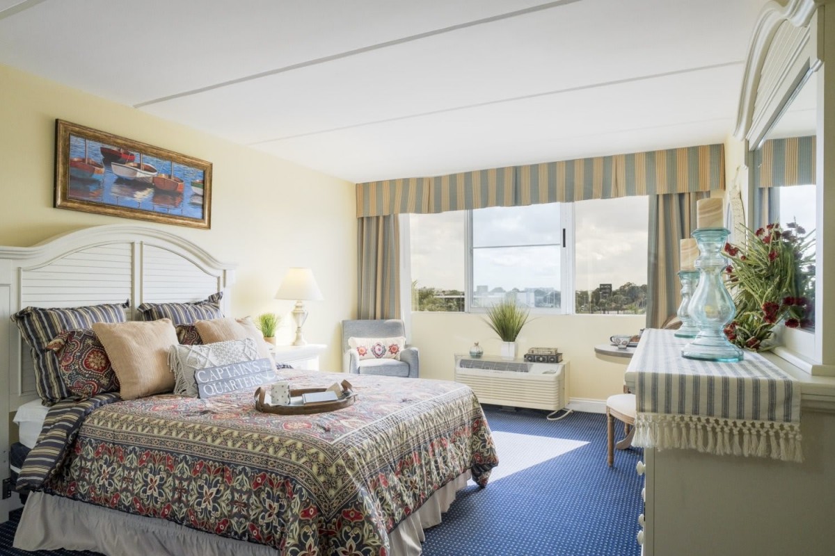 A bright and cozy bedroom with natural light streaming through the window.