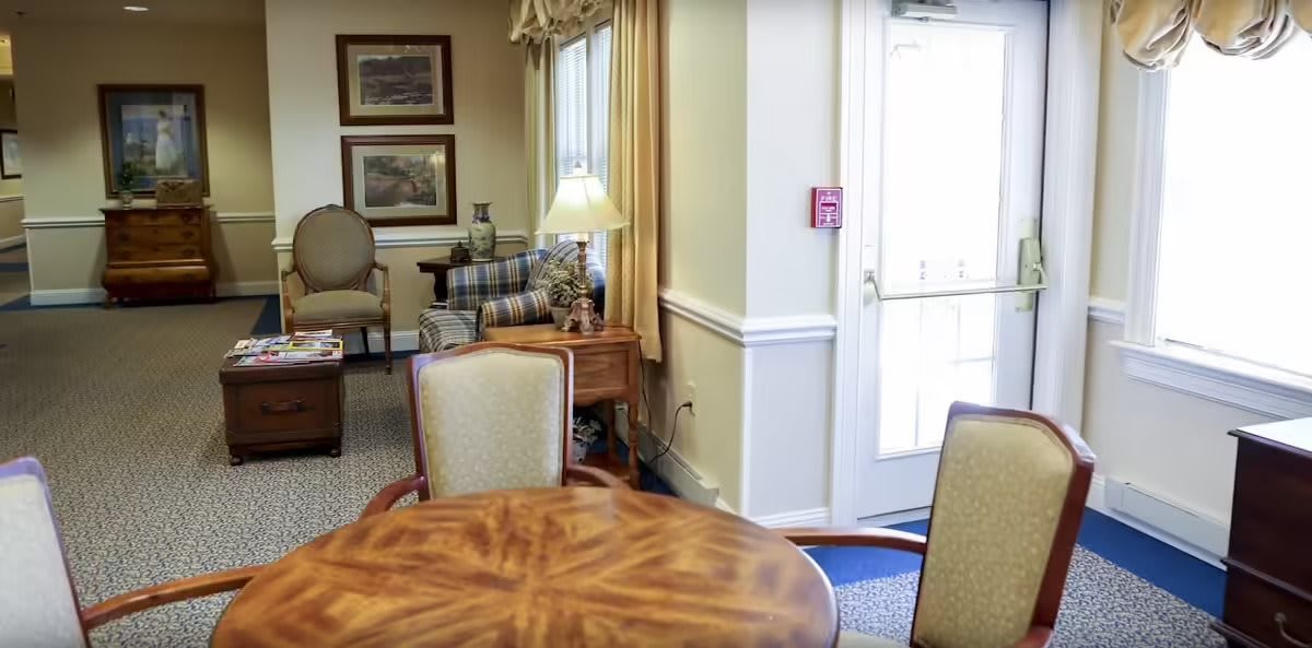 A cozy living room with comfortable seating and classic decor.