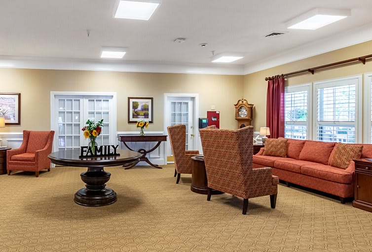 A cozy living room with comfortable seating and warm decor.