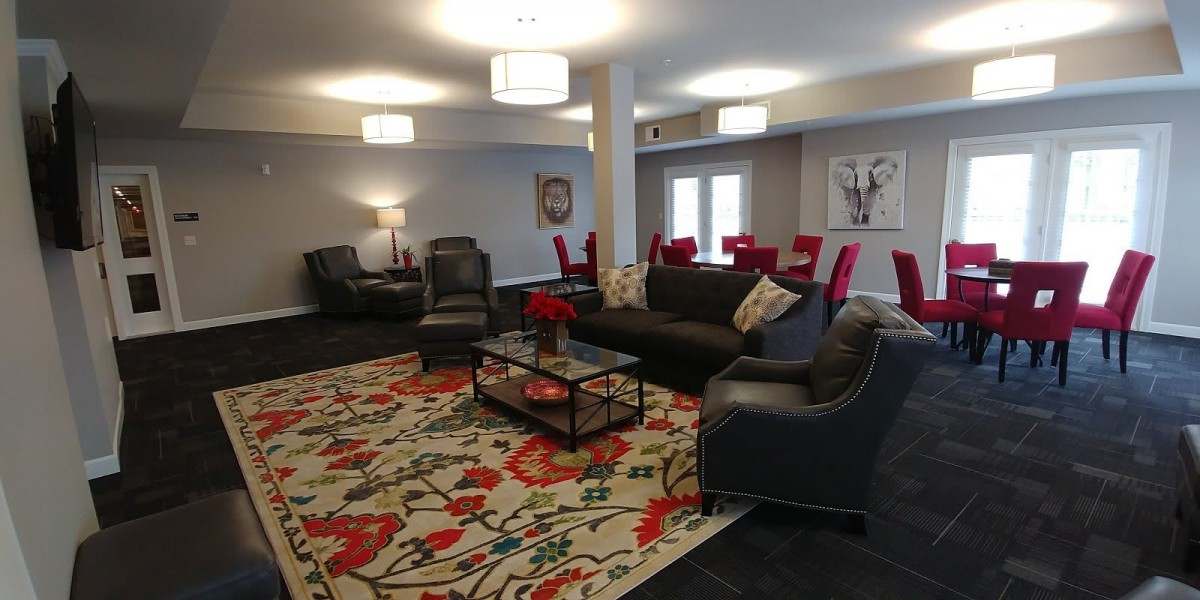 A modern living room with stylish furniture and colorful decor.