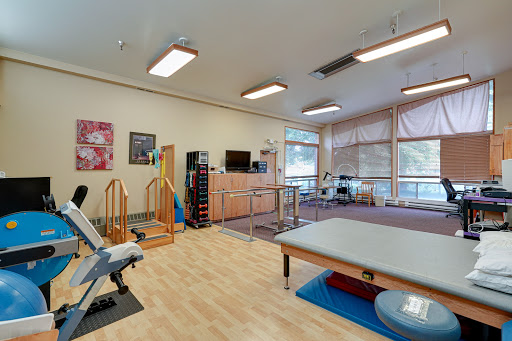 A well-equipped physical therapy room designed for rehabilitation activities.