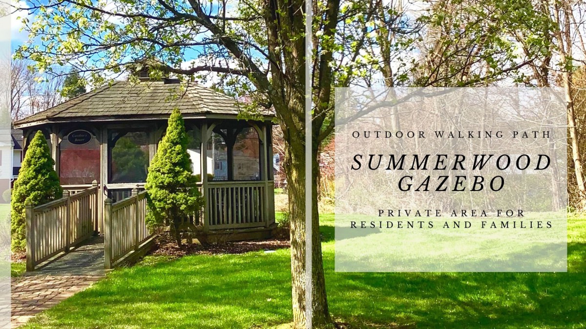 A private summer gazebo surrounded by greenery, exclusive for residents' use.