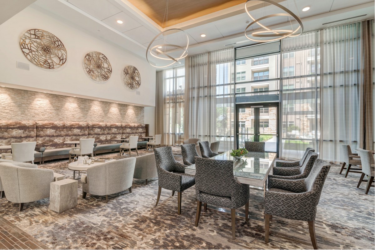 A modern lounge area with elegant furniture and stylish lighting.