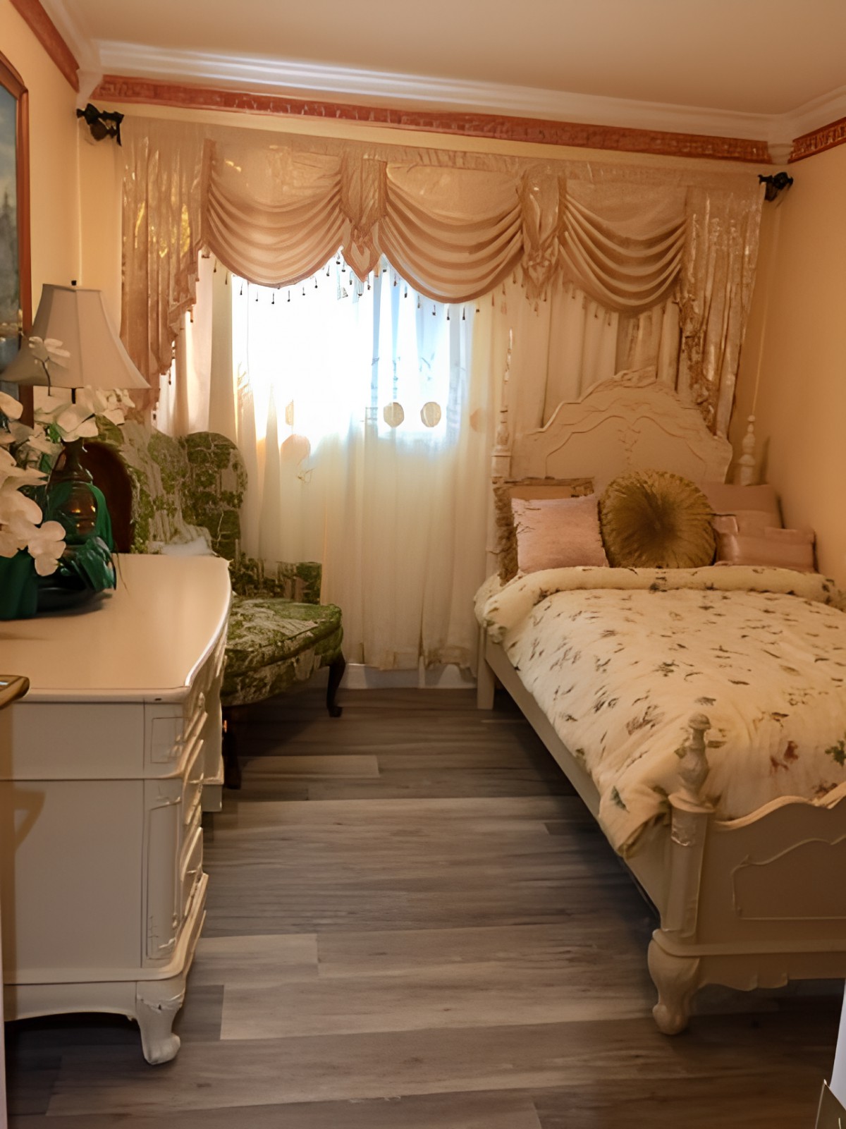 A cozy vintage-style bedroom with elegant decor and furniture.
