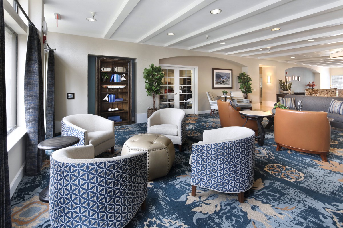 A modern and stylish lounge area with comfortable seating and elegant decor.