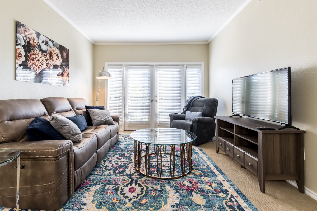 A cozy living room with comfortable seating and stylish decor.