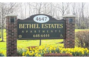 Sign for Bethel Estates Apartments with contact information.