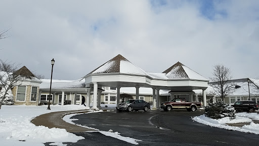 A hotel entrance covered in snow during winter.