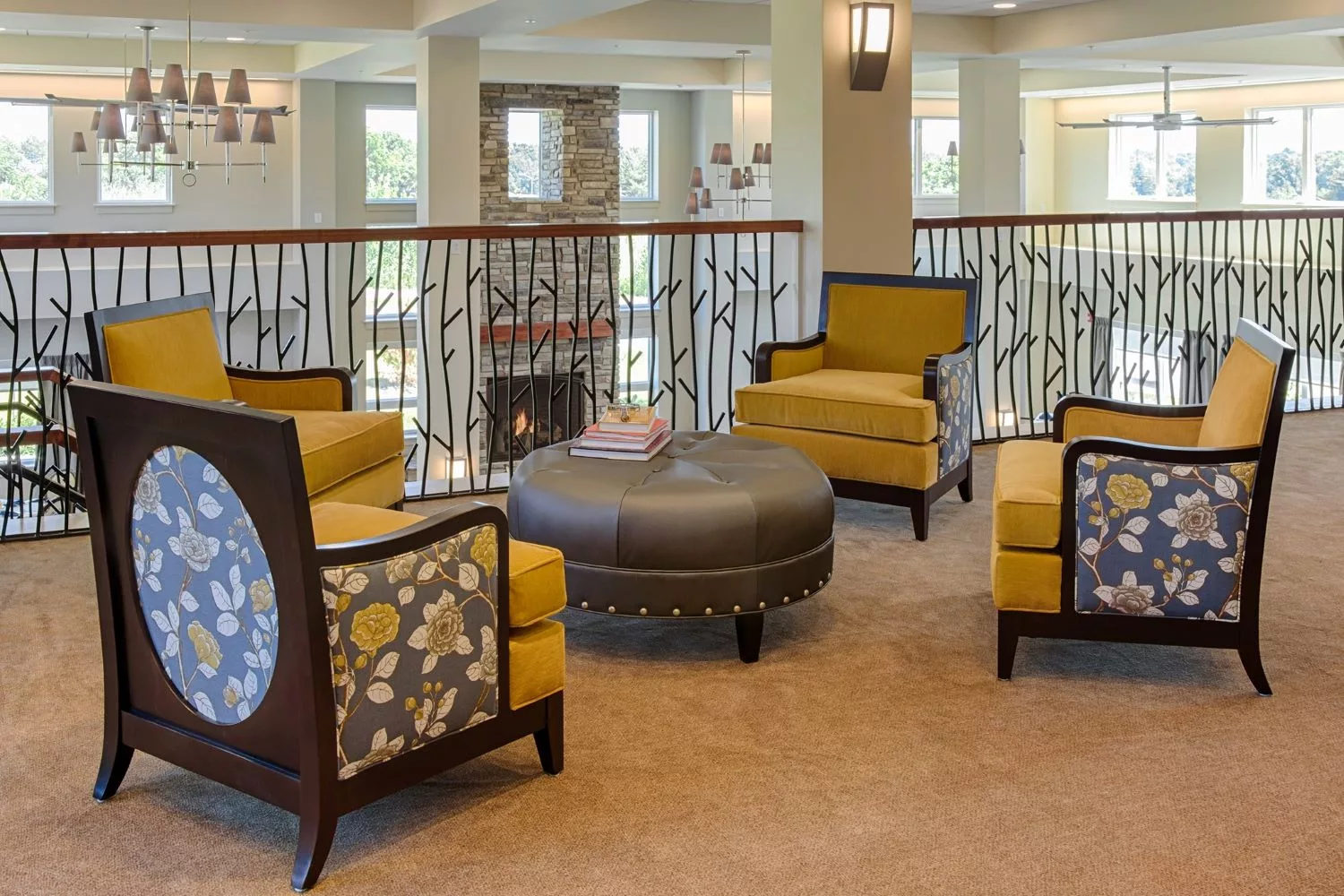 A cozy lounge area with stylish chairs and a central table.