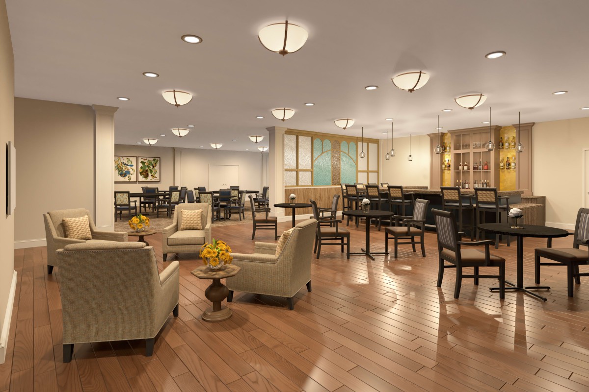 A modern lounge area with comfortable seating and elegant lighting.