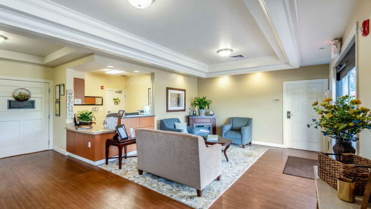 A cozy waiting room with comfortable seating and welcoming decor.