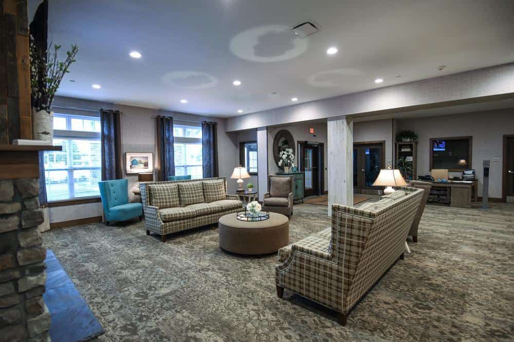 Spacious and elegant lobby with comfortable seating and modern decor.
