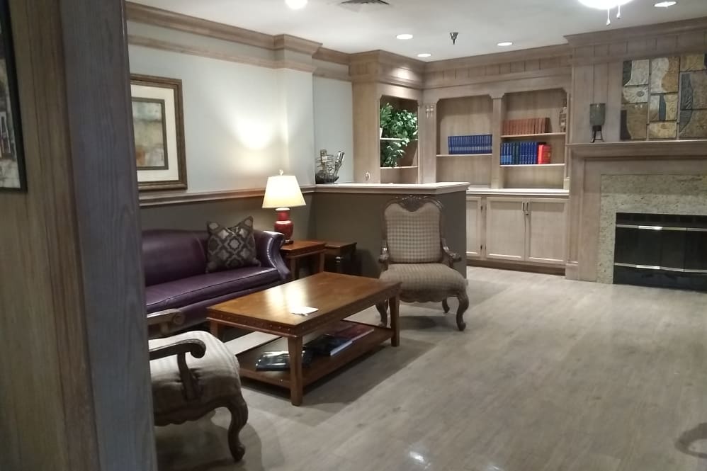 A cozy lobby area with comfortable seating and elegant decor.