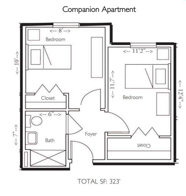 A floor plan of a compact companion apartment featuring two bedrooms, a shared bathroom, and individual closets.
