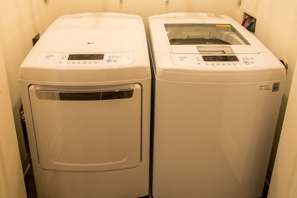 A washer and dryer set in a laundry room.