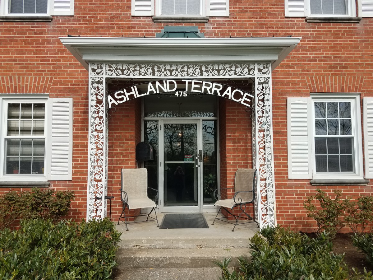 Entrance to a building with 'Ashland Terrace' signage above the door.