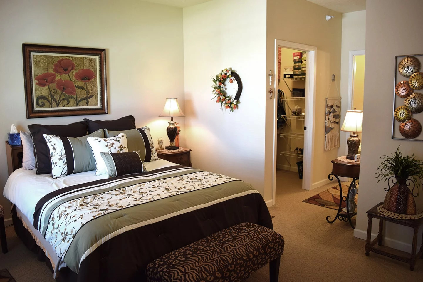 A cozy bedroom with elegant decor and a walk-in closet.