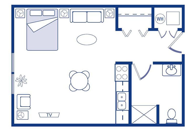 Studio apartment floor plan with designated areas for living, sleeping, and kitchen.