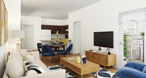 A stylish living room featuring an open concept design, with modern furnishings and a cozy dining area.