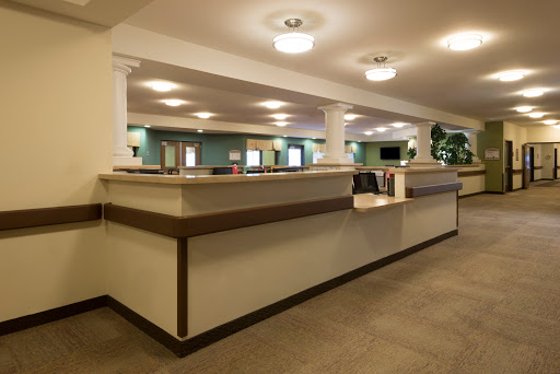 A spacious and well-lit reception area with a modern design.