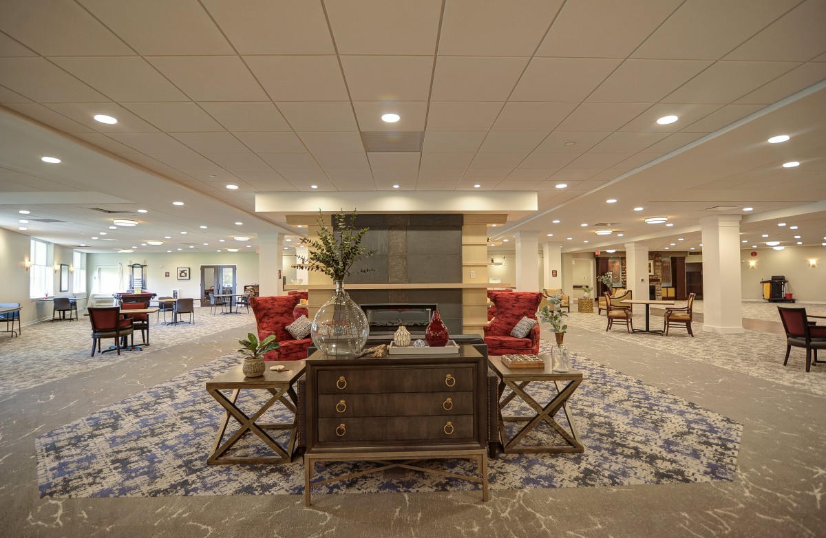 A modern hotel lobby with elegant furniture and decor.