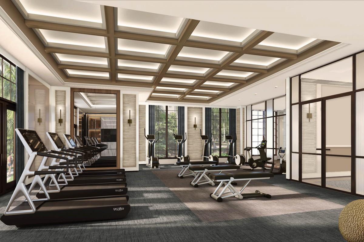 A modern gym equipped with treadmills and exercise machines.