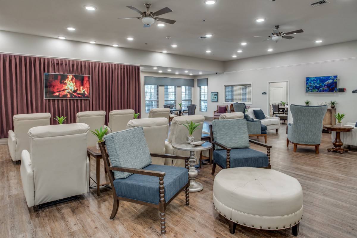 A modern lounge with comfortable seating and stylish decor.