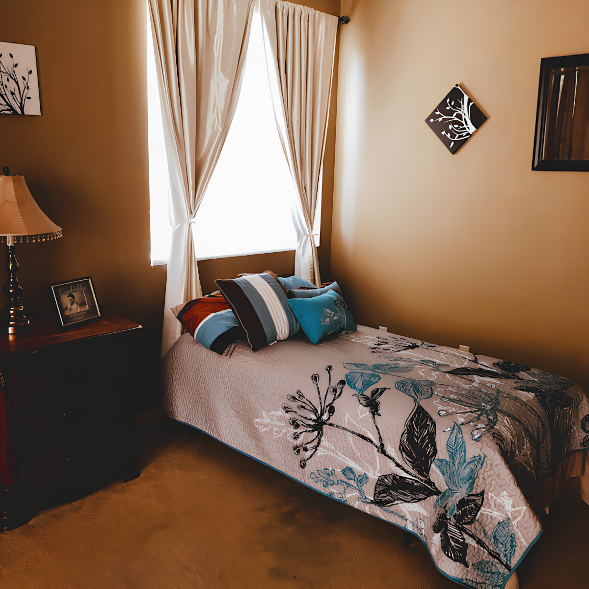 A cozy bedroom with a single bed and decorative elements.