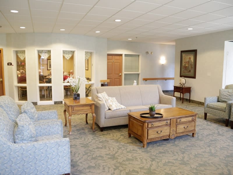 A cozy living room with comfortable seating and warm decor.