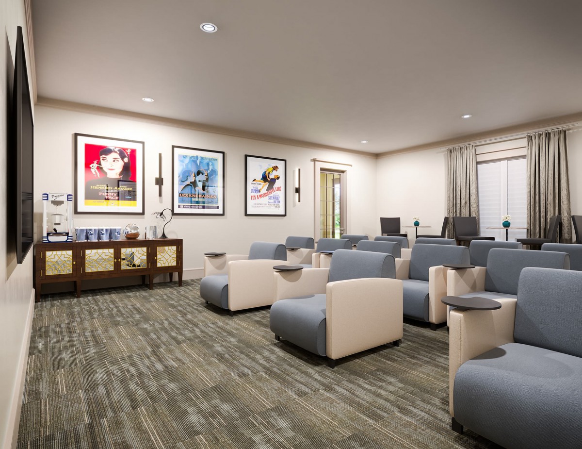 A cozy home theater room with comfortable seating and movie posters on the walls.