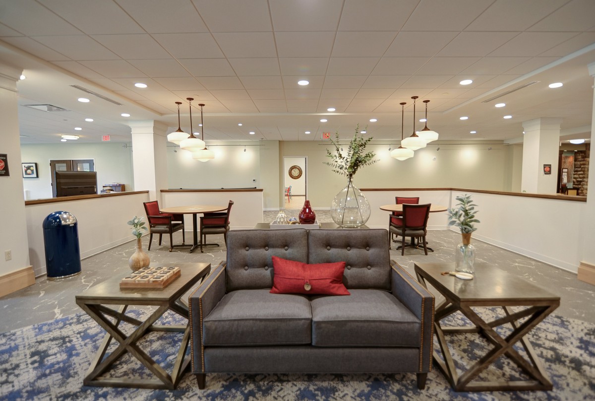 A modern living room with stylish decor and comfortable seating.