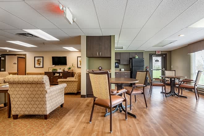 A comfortable and cozy living and dining area with seating arrangements.