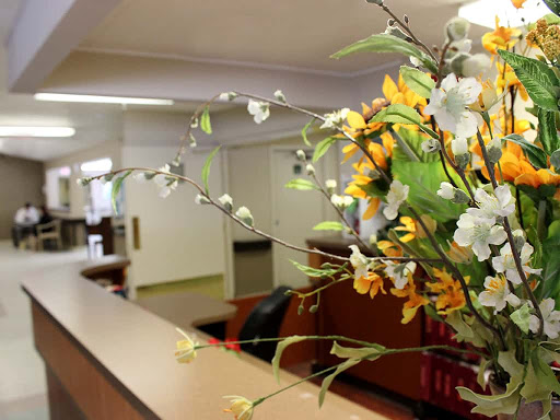 A beautifully arranged floral display in a welcoming reception area.
