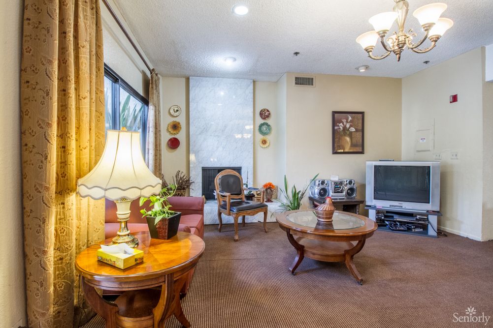 A cozy living room with elegant furniture and decor.