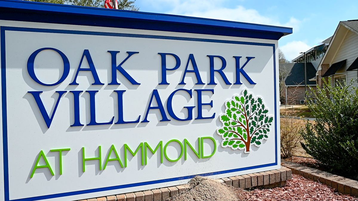 Entrance sign for Oak Park Village in Hammond.