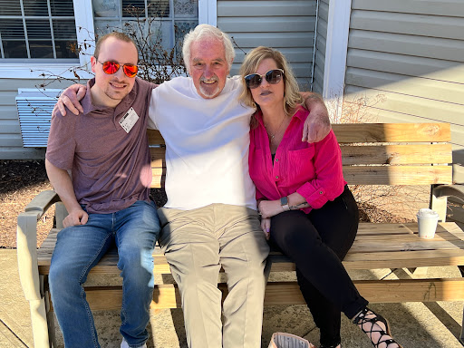 A joyful moment shared among friends on a sunny day.