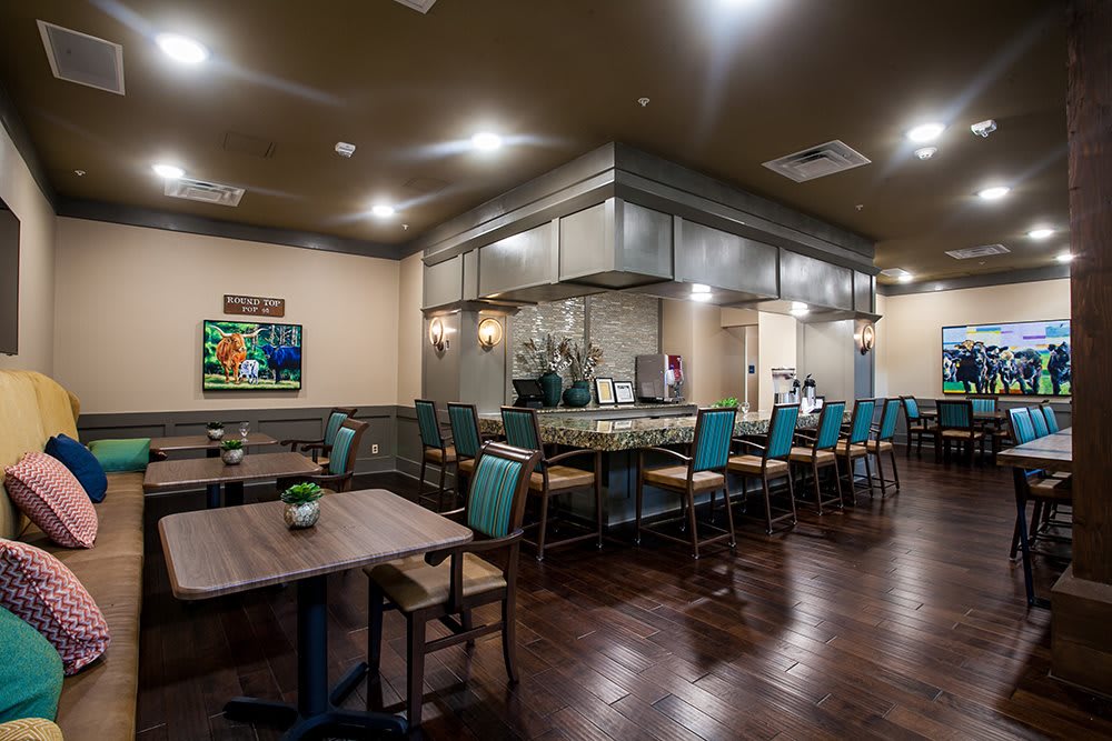 Modern restaurant interior with a spacious dining area and stylish decor.