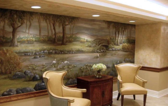 Elegant interior with a landscape mural and seating area.