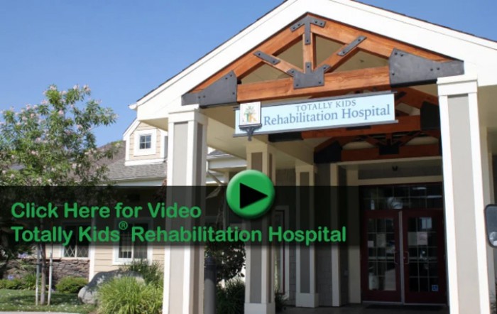 Entrance to a rehabilitation hospital with visible signage.