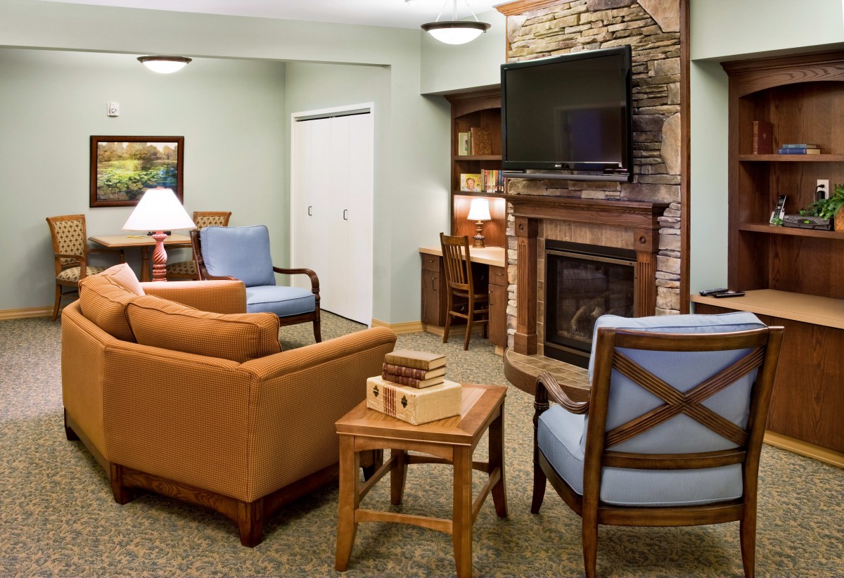 Cozy living room with a fireplace and comfortable seating.
